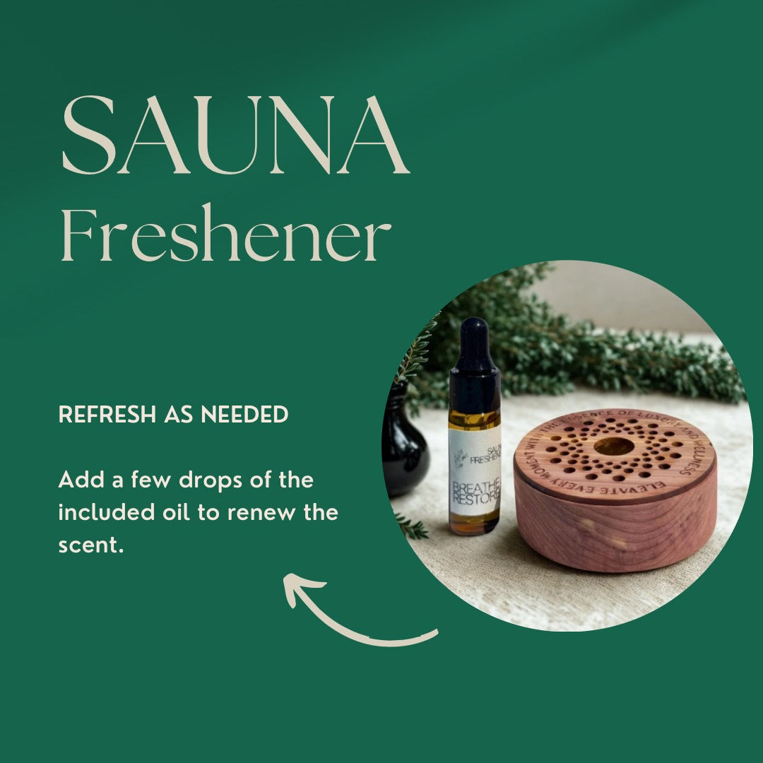 Sauna freshener set with bottle, diffuser, and wood product on a green background